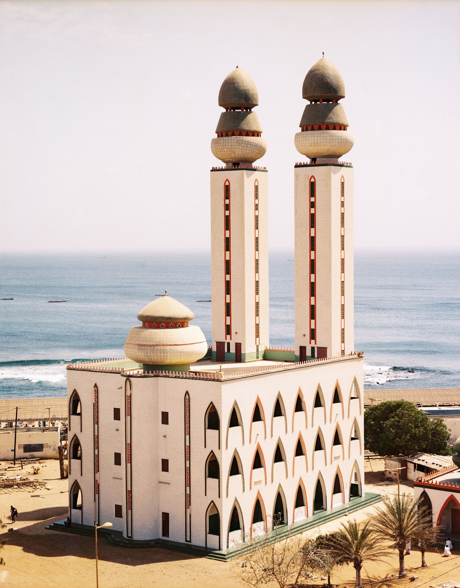Vertical shot of the Grand Mosque of Dakar in Senegal with a seascape in the background